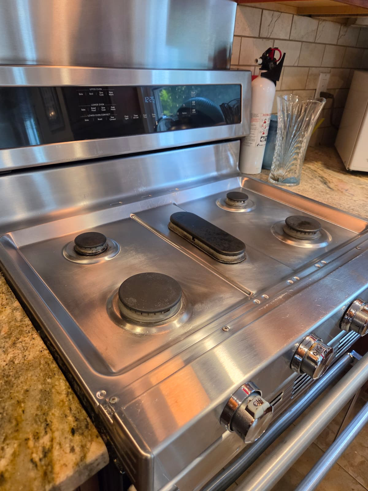 After cleaning: the same stainless steel stovetop cleaned and polished
